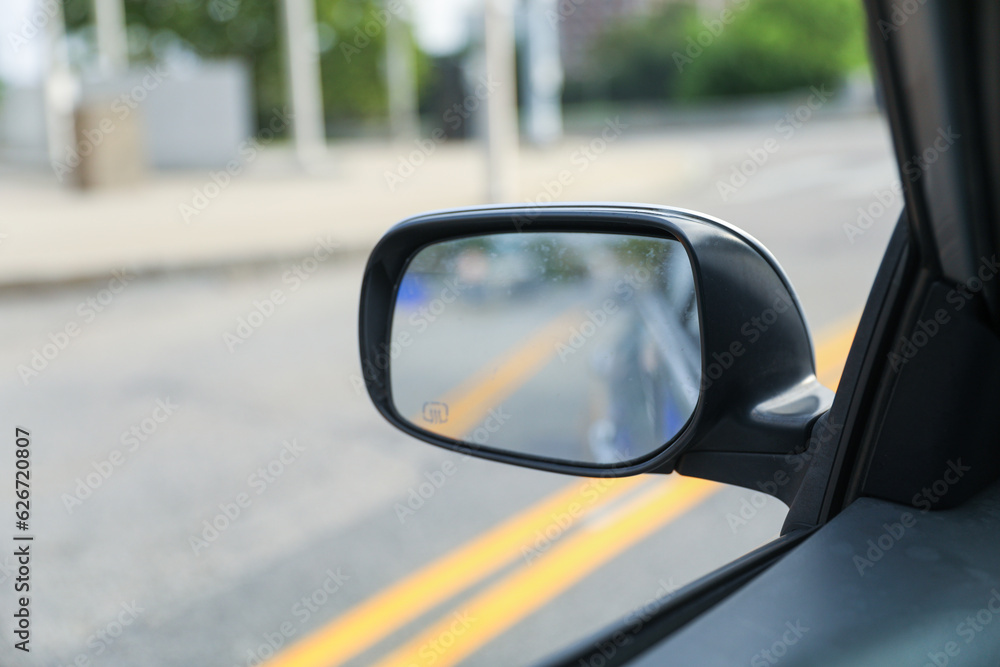 Car mirror reflects life's journey, symbolizing reflection, hindsight, self-awareness, and the road ahead. Metaphor for introspection Car mirror reflects life's journey, symbolizing reflection, hindsight, self-awareness, and the road ahead. Metaphor for introspection