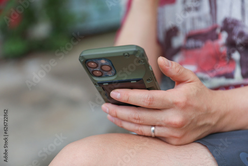 modern connectivity, human touch meets technology as hands hold a phone, bridging distance, communication, and digital era