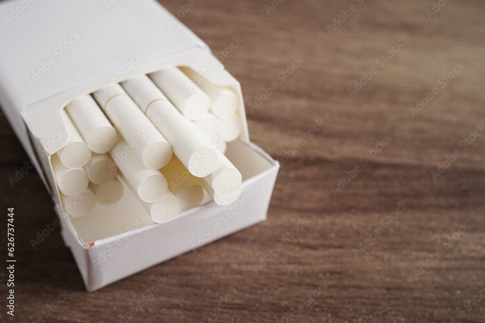 Cigarette in pack, roll tobacco in paper with filter tube, No smoking concept. Cigarette in pack, roll tobacco in paper with filter tube, No smoking concept.
