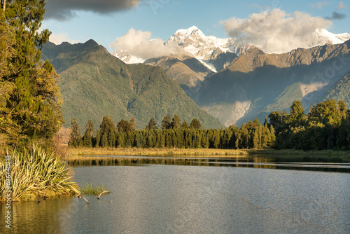 The scenic iconic Matheson Lake in Fox Glacier with the Southern alps in the background in the West Coast New Zealand photo