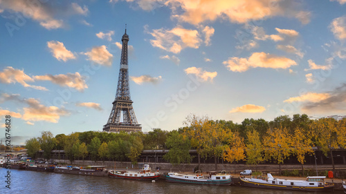 Panoramic view in Paris Eiffel Tower and river Seine in Paris, France. Eiffel Tower is one of the most iconic landmarks of Paris.
