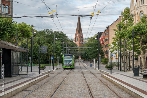 tram line in Lund with Allhelgonakyrkan in the background