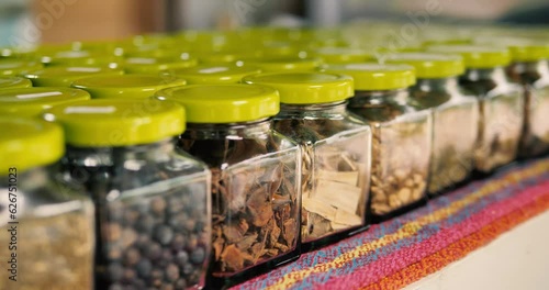 Various jars of seeds, 4k, slowmo photo