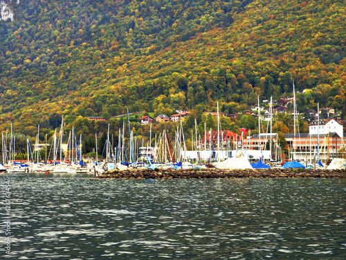 A harbor filled with ships on Lake Geneva, Switzerland.