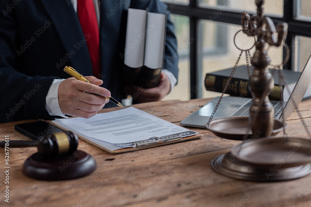 Male business man lawyers working with contract papers at the law firms. Judge gavel with scales of justice. Legal law, lawyer, documents, advice and attorney, court judge, concept. Male business man lawyers working with contract papers at the law firms. Judge gavel with scales of justice. Legal law, lawyer, documents, advice and attorney, court judge, concept.