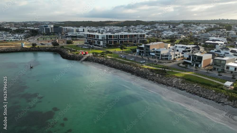 Coogee beach seafront suburb in Perth city at sunset, Australia. Aerial backward Coogee beach seafront suburb in Perth city at sunset, Australia. Aerial backward