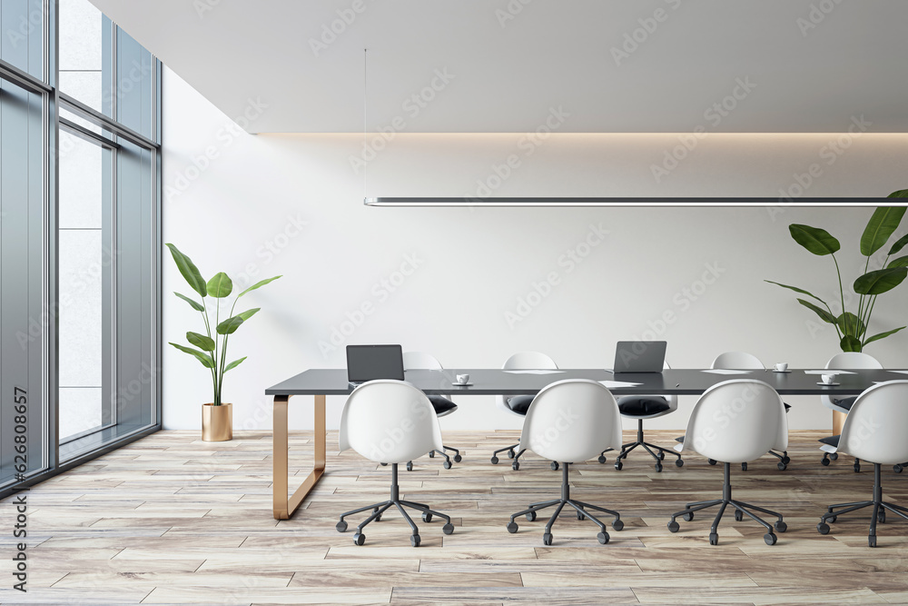 Side view of empty modern conference room with office table and chairs ...