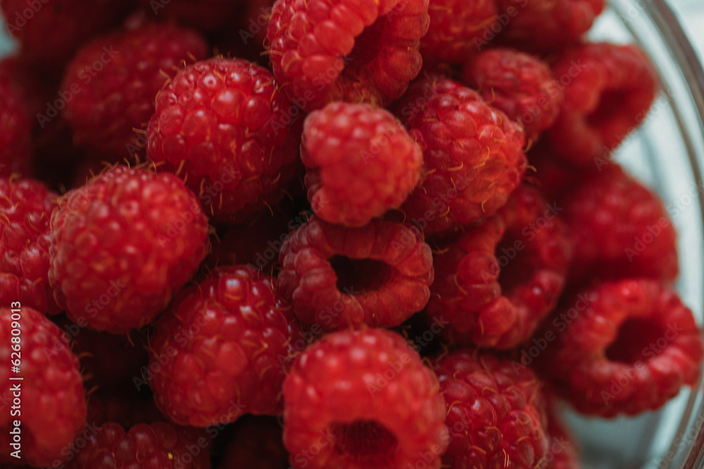 raspberries in a bowl. Fruits. Background food. Vitamin raspberries in a bowl. Fruits. Background food. Vitamin