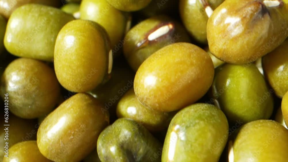 Macro video using a probe lens showcases captivating and informative views of mung bean seeds, revealing their beauty and complexity unseen by the naked eye. Food concept
Macro video using a probe lens showcases captivating and informative views of mung bean seeds, revealing their beauty and complexity unseen by the naked eye. Food concept