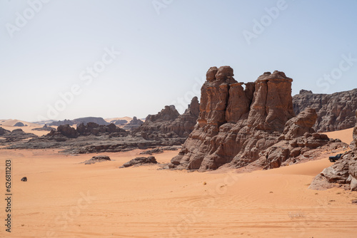 view in the Sahara desert of Tadrart rouge tassili najer in Djanet City   Algeria.colorful orange sand  rocky mountains 