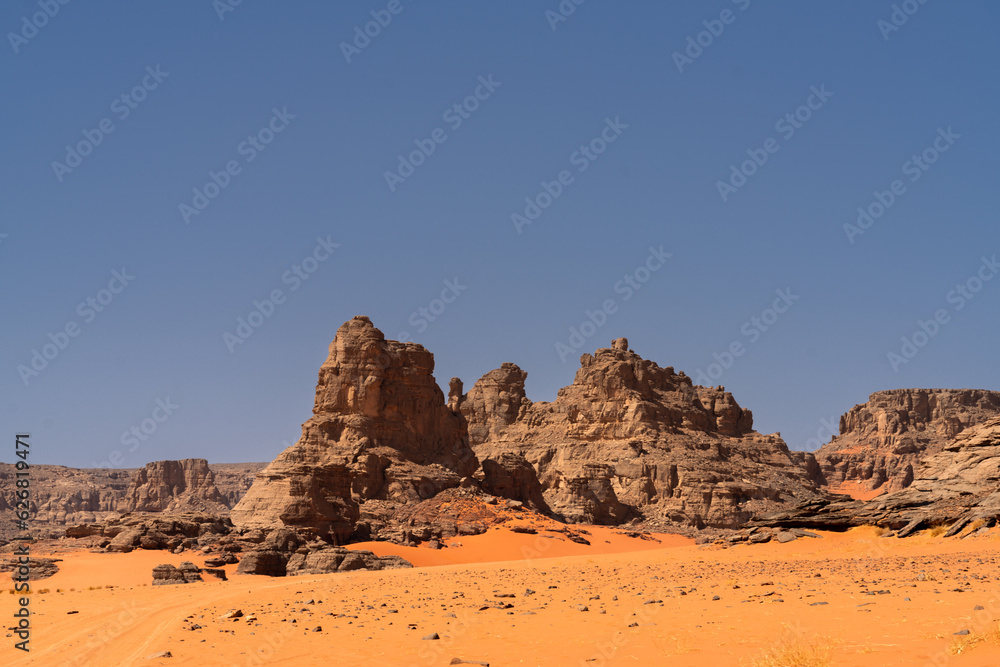 view in the Sahara desert of Tadrart rouge tassili najer in Djanet City  ,Algeria.colorful orange sand, rocky mountains