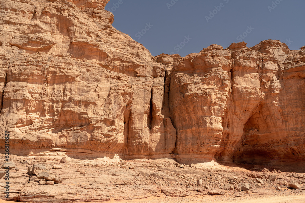 Fototapeta premium view in the Sahara desert of Tadrart rouge tassili najer in Djanet City ,Algeria.colorful orange sand, rocky mountains