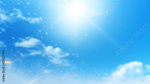 Blue sky background with white clouds and sun