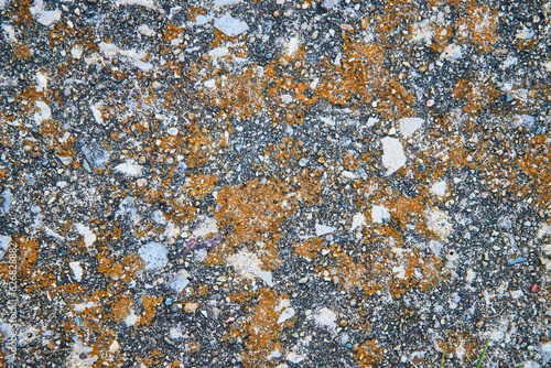 Textured background asset, rust, moss, lichen covered, bespeckled rock, abstract pattern photo