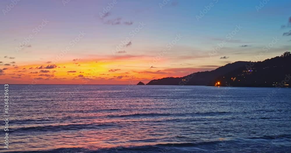 aerial view scenery reflection of beautiful sky on surfece water.Sunsets are often accompanied by colorful clouds..stunning red sunset over the sea. video 4K Nature video High quality footage. aerial view scenery reflection of beautiful sky on surfece water.Sunsets are often accompanied by colorful clouds..stunning red sunset over the sea. video 4K Nature video High quality footage.
