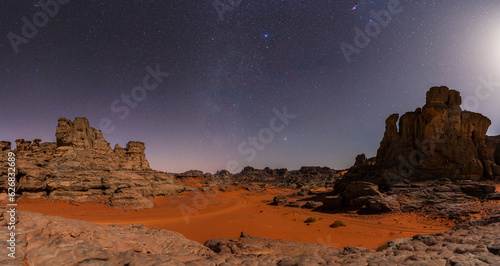 view in the Sahara desert of Tadrart rouge tassili najer by night in Djanet City  ,Algeria.colorful orange sand, rocky mountains