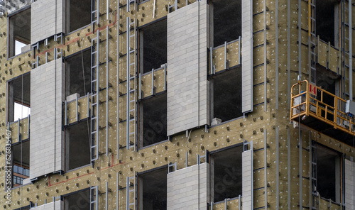Photos Installation of external wall thermal insulation with rock wool