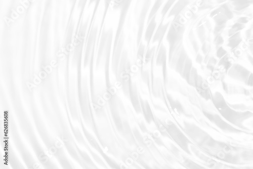 White water with ripples on the surface. Defocus blurred transparent white colored clear calm water surface texture with splashes and bubbles. Water waves with shining pattern texture background. © Water 💧 Shining 📸