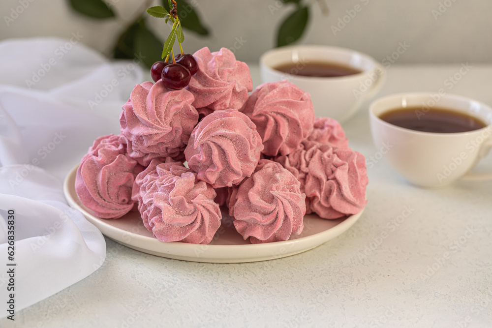 Cherry pink zephyr summer dessert on a light background Cherry pink zephyr summer dessert on a light background