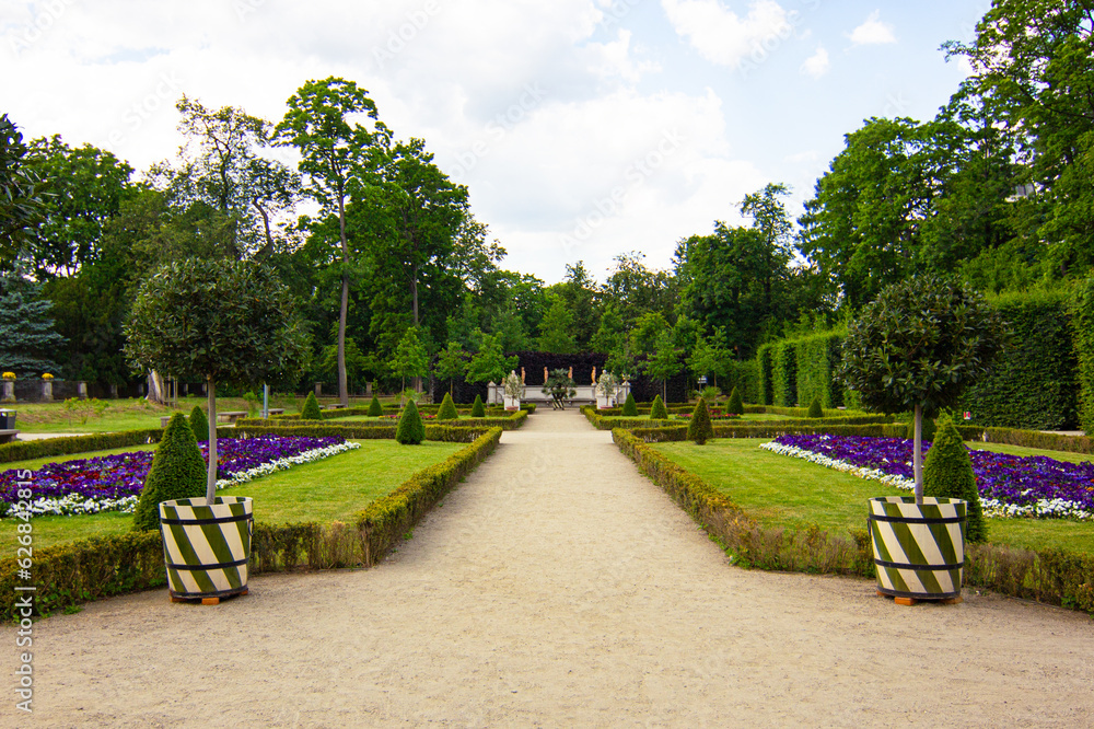 Beautiful garden with flowers on the territory of royal Wilanow Palace in Warsaw, Poland