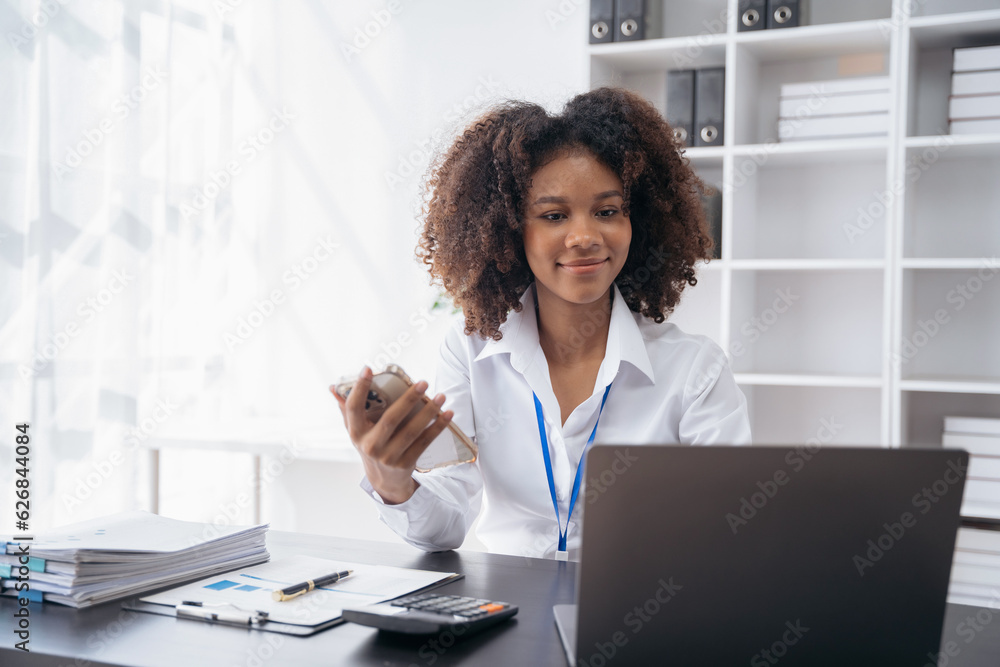 Business woman using digital tablet analyzes business data, busy working on laptop computer with smart phone and business report on office desk, business strategy analysis concept. Business woman using digital tablet analyzes business data, busy working on laptop computer with smart phone and business report on office desk, business strategy analysis concept.