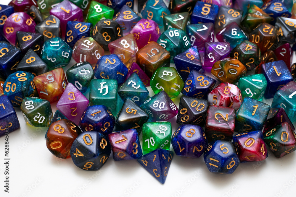 different colours dices for fantasy dnd and rpg tabletop games. Board game polyhedral dices with different sides isolated on white background