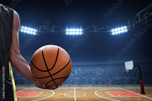 Basketball male player holding a ball © fotokitas