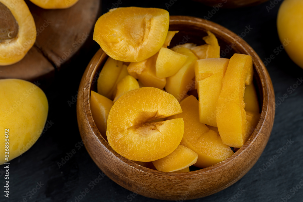 ripe yellow apricots on the table close-up ripe yellow apricots on the table close-up