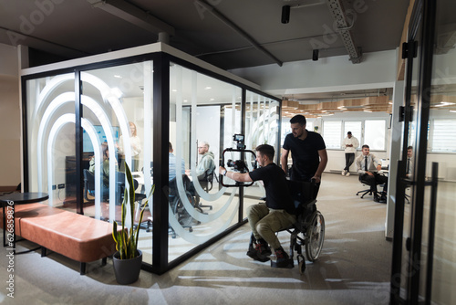 In a modern office, a professional team of videographers captures the essence of creativity and innovation as they film a group of young entrepreneurs, symbolizing collaboration and ambition in the