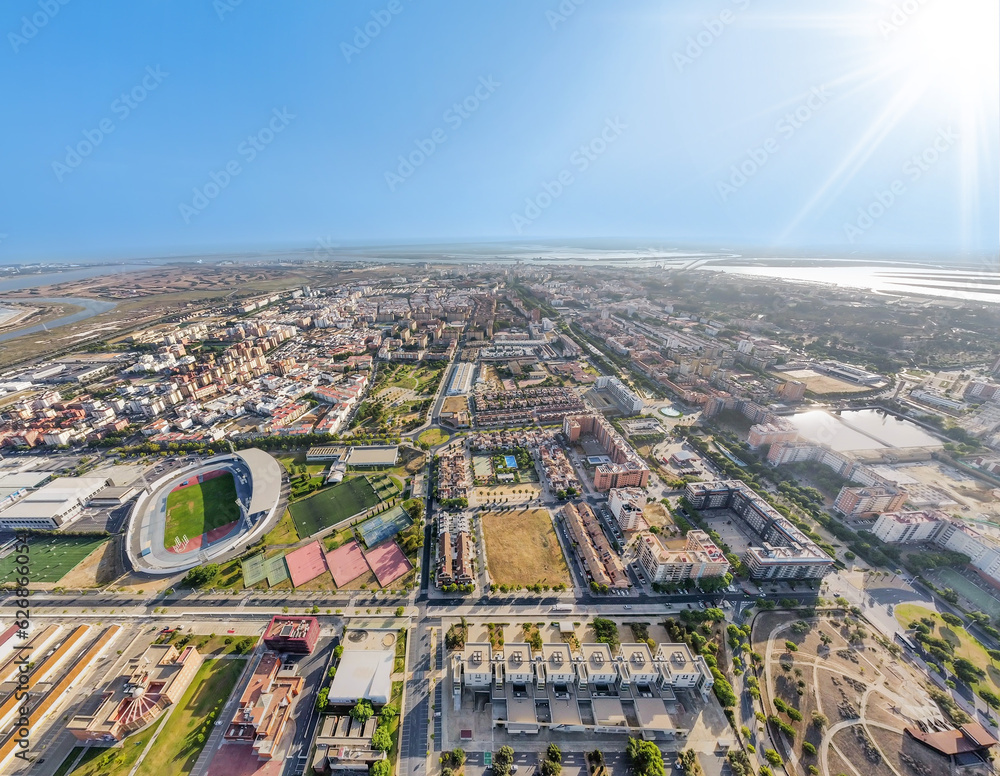 Wide angle panoramic aerial view of Huelva city from the main entrance to the city