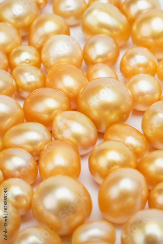 close up deep gold pearls