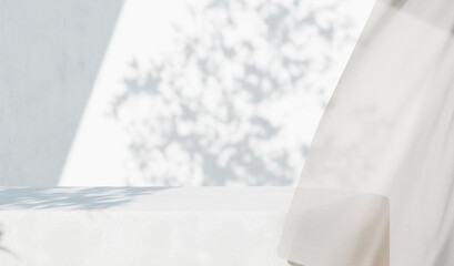 White concrete empty table, organic curtain and plant shadow on cement wall. Summer exterior scene for product placement mockup. Neutral minimal aesthetic.