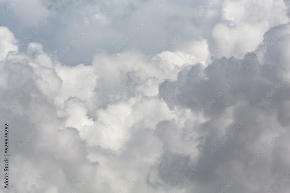 Thick cumulus clouds on the sky, atmosphere background