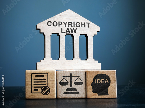 Cubes Copyright law and a sign on them.