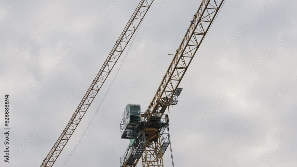 New centre apartment building under construction with tower crane New centre apartment building under construction with tower crane