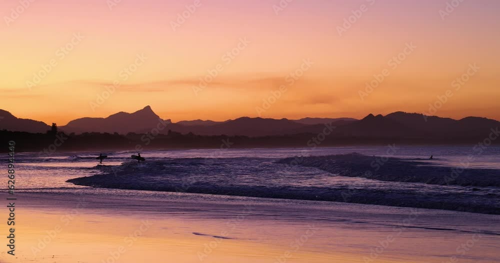Sunset beach views across Main Beach in Byron Bay, New South Wales, Eastern Australia Sunset beach views across Main Beach in Byron Bay, New South Wales, Eastern Australia