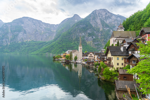A Beautiful Lakeside View with Stunning Mountain Scenery and Historic Buildings. Captivating Hallstatt: A Picturesque Journey to a World Heritage Gem. © twabian