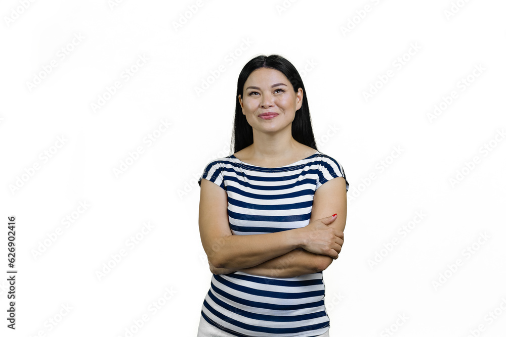 Portrait of a young asian woman with folded arms is looking up. Isolated on white. Portrait of a young asian woman with folded arms is looking up. Isolated on white.