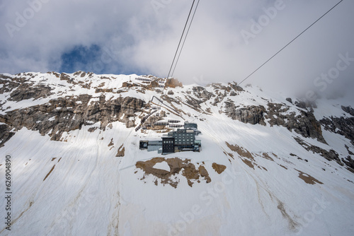 Overlooking the snow-covered ski facilities from the cable car. The Zugspitze belongs to the Alps and is the highest mountain in Germany. © twabian