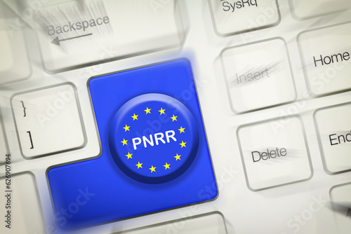 words 'PNRR' on blue key of a laptop keyboard. The National Recovery and Resilience Plan is part of the Next Generation EU Programme.