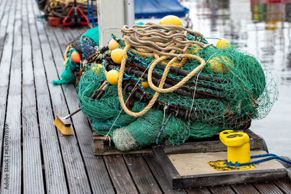 Fishing nets for sea fishing on the boards of the pier. Fishing nets for sea fishing on the boards of the pier.