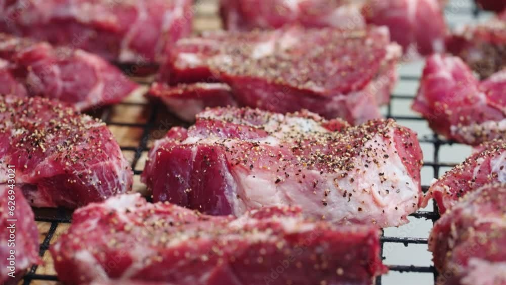 Pieces Of Raw Beef Meat With Spices And Salt, Delicious Steak From Marble Beef In Luxury Restaurant Pieces Of Raw Beef Meat With Spices And Salt, Delicious Steak From Marble Beef In Luxury Restaurant