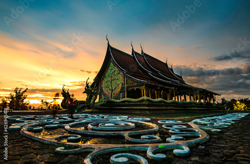 Church of Wat Phra That Phu Prao during evening light at sunset around glow, Ubon Ratchathani Province, Thailand
