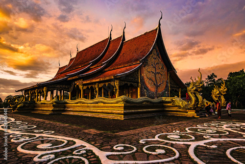 Church of Wat Phra That Phu Prao during evening light at sunset around glow, Ubon Ratchathani Province, Thailand © Chay