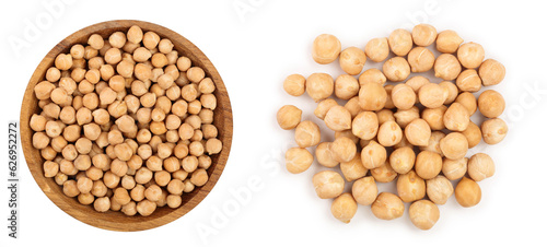 Dry raw organic chickpeas in wooden bowl isolated on white background. Top view photo