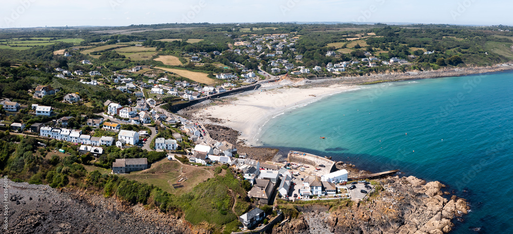 Aerial view of the Cornish fishing village of Coverack and its sandy beach