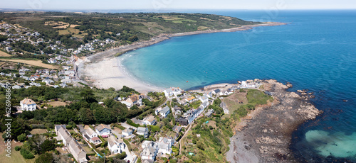 Aerial view of the Cornish fishing village of Coverack and its sandy beach