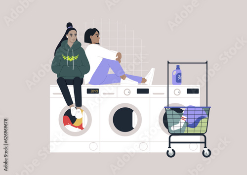 Household chores concept, a couple of young characters waiting for their laundry in a coin laundromat