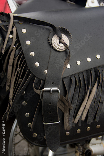 detail of motorcycle leather saddlebag