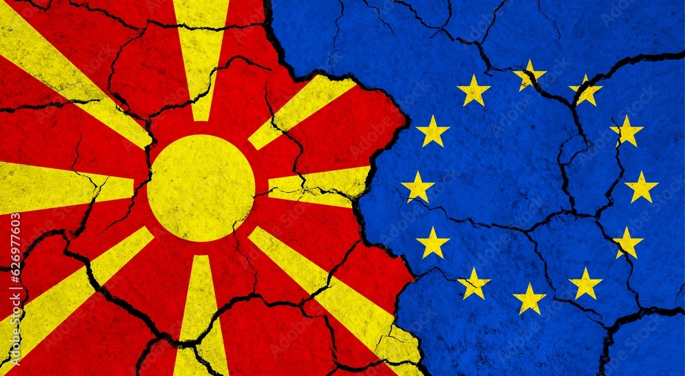 Flags of Macedonia and European Union on cracked surface - politics, relationship concept